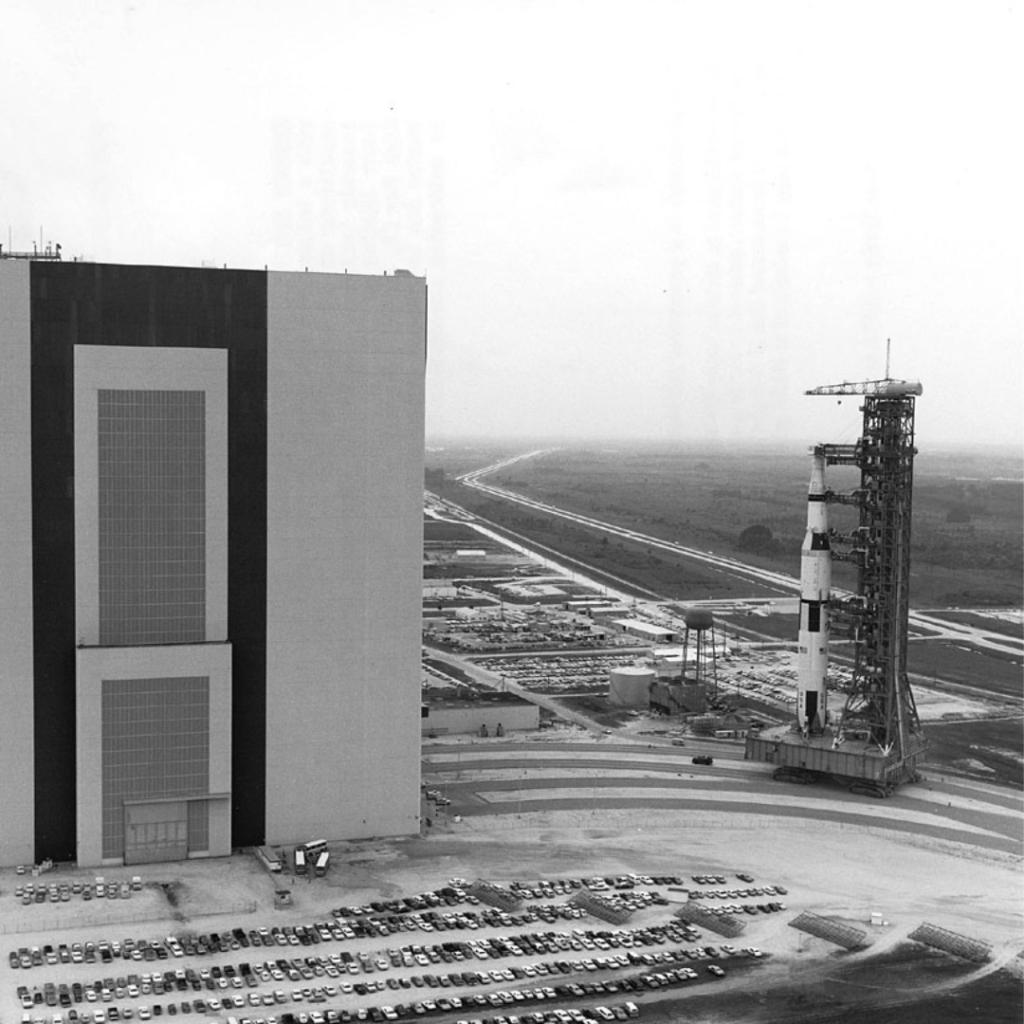 Apollo 13 Saturn V with boilerplate spacecraft during transfer move from High Bay 2 to High Bay 3. 8 August 1969. Scan by J.L. Pickering.